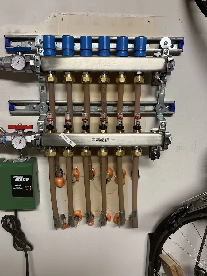 Plumber performing Leak Detection at a residential property in South Lyon